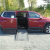 Red Chevrolet Traverse with BraunAbility Side Entry Automatic In Floor conversion
