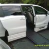 White Honda Odyssey with BraunAbility Side Entry Automatic In Floor conversion