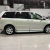 Silver Toyota Sienna with BraunAbility Side Entry Automatic Fold Out conversion