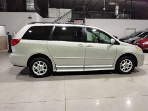 Silver Toyota Sienna with BraunAbility Side Entry Automatic Fold Out conversion