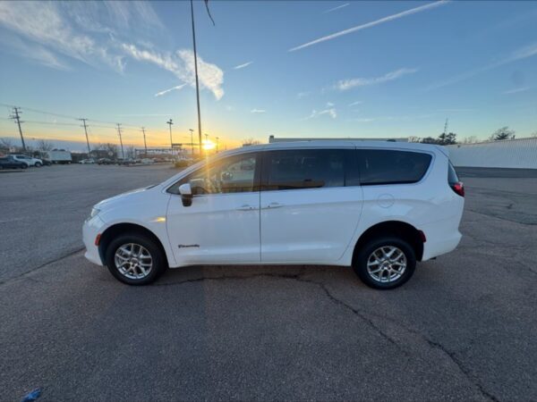 White Chrysler Voyager with BraunAbility Rear Entry Manual Fold Out conversion