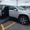 Silver Chevrolet Traverse with BraunAbility Side Entry Automatic In Floor conversion