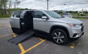 Silver Chevrolet Traverse with BraunAbility Side Entry Automatic In Floor conversion