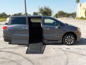 Grey Honda Odyssey with BraunAbility Side Entry Automatic In Floor conversion