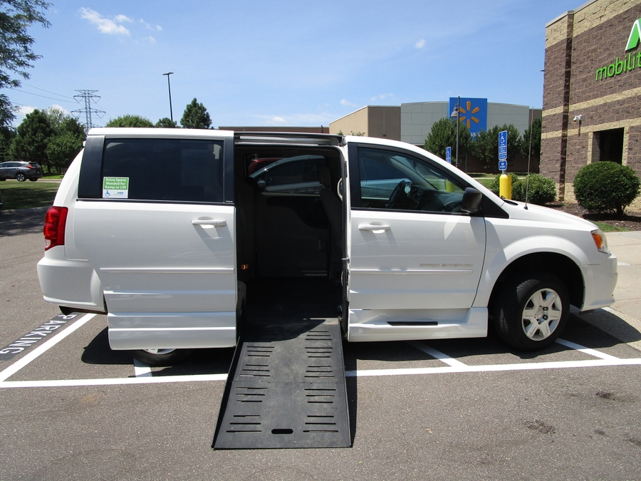 White Dodge Grand Caravan with BraunAbility Side Entry Manual Fold Out conversion