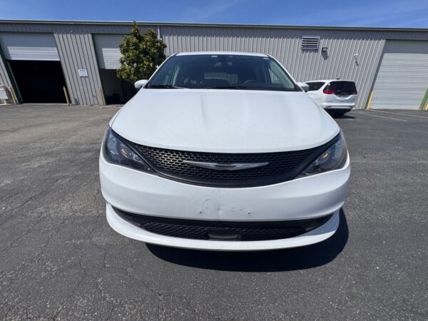 White Chrysler Voyager with Vantage Mobility Side Entry Manual In Floor conversion