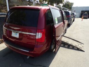 Red Chrysler Town and Country with BraunAbility Side Entry Automatic Fold Out conversion