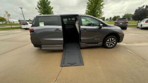 Grey Honda Odyssey with BraunAbility Side Entry Automatic In Floor conversion