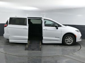 White Chrysler Pacifica with BraunAbility Side Entry Automatic Fold Out conversion