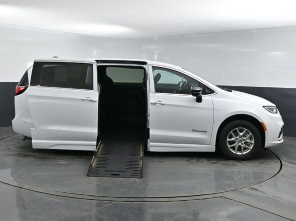 White Chrysler Pacifica with BraunAbility Side Entry Automatic Fold Out conversion
