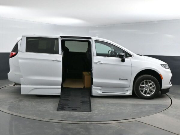 White Chrysler Pacifica with BraunAbility Side Entry Automatic Fold Out conversion
