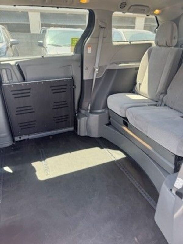 Black Toyota Sienna with BraunAbility Side Entry Automatic Fold Out conversion