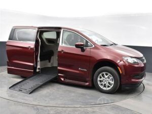 Red Chrysler Voyager with BraunAbility Side Entry Automatic Fold Out conversion