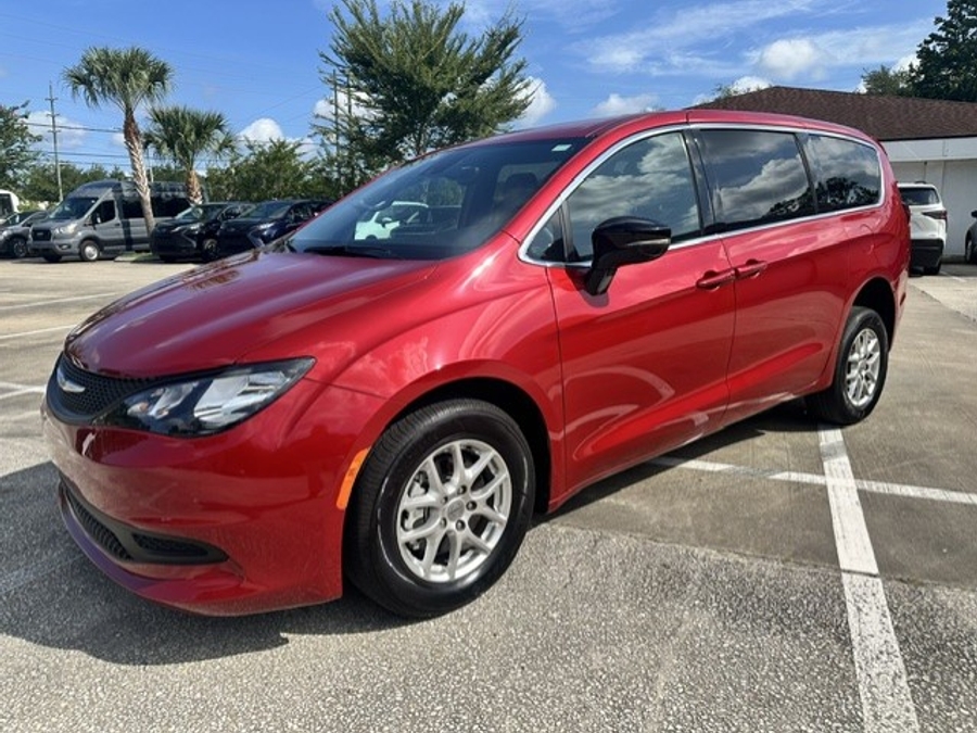 Red Chrysler Voyager with ATS Rear Entry Manual Fold Out conversion