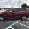 Red Chrysler Voyager with BraunAbility Side Entry Automatic Fold Out conversion