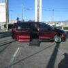 Red Chrysler Pacifica with Vantage Mobility Side Entry Automatic In Floor conversion