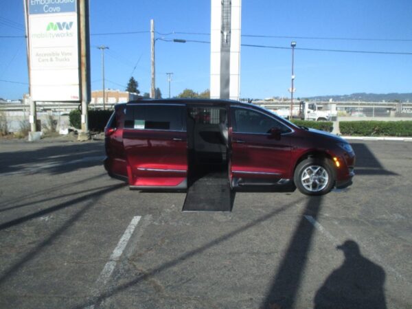 Red Chrysler Pacifica with Vantage Mobility Side Entry Automatic In Floor conversion