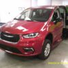 Red Chrysler Pacifica with Driverge Side Entry Automatic Fold Out conversion