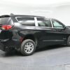 Black Chrysler Voyager with BraunAbility Rear Entry Manual Fold Out conversion