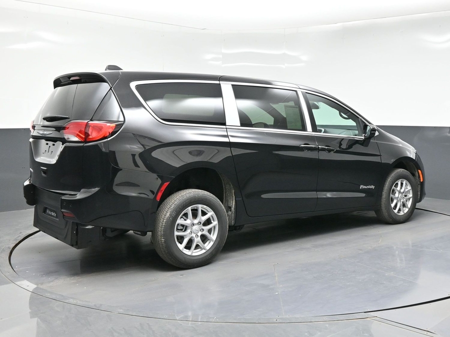 Black Chrysler Voyager with BraunAbility Rear Entry Manual Fold Out conversion