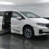 White Honda Odyssey with BraunAbility Side Entry Automatic In Floor conversion