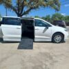 White Chrysler Pacifica with BraunAbility Side Entry Automatic Fold Out conversion