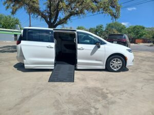 White Chrysler Pacifica with BraunAbility Side Entry Automatic Fold Out conversion