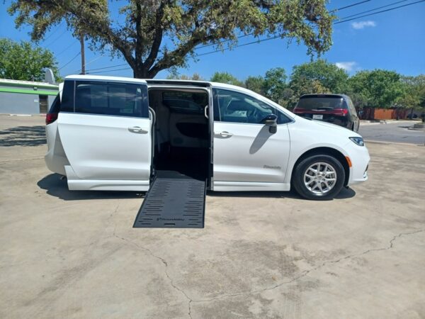 White Chrysler Pacifica with BraunAbility Side Entry Automatic Fold Out conversion
