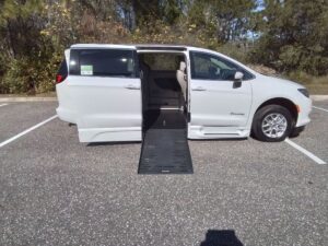 White Chrysler Voyager with BraunAbility Side Entry Automatic Fold Out conversion