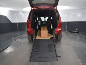 Red Chrysler Pacifica with BraunAbility Rear Entry Manual Fold Out conversion