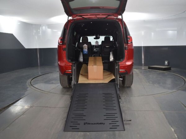 Red Chrysler Pacifica with BraunAbility Rear Entry Manual Fold Out conversion