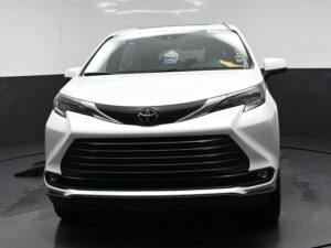 White Toyota Sienna with BraunAbility Side Entry Automatic Fold Out conversion