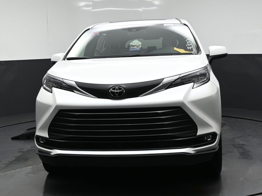 White Toyota Sienna with BraunAbility Side Entry Automatic Fold Out conversion