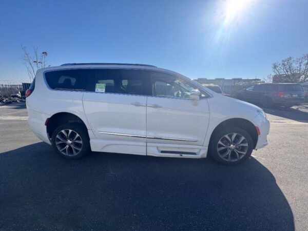 White Chrysler Pacifica with BraunAbility Side Entry Automatic In Floor conversion