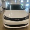 White Chrysler Voyager with Driverge Rear Entry Manual Fold Out conversion
