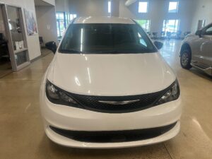 White Chrysler Voyager with Driverge Rear Entry Manual Fold Out conversion