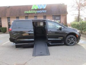 Black Chrysler Pacifica with BraunAbility Side Entry Automatic In Floor conversion