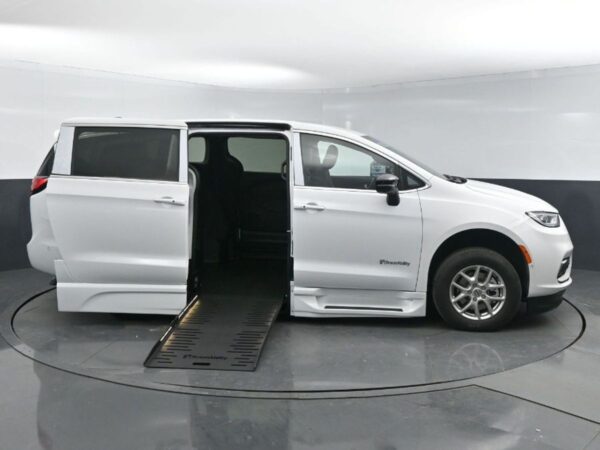 White Chrysler Pacifica with BraunAbility Side Entry Automatic Fold Out conversion