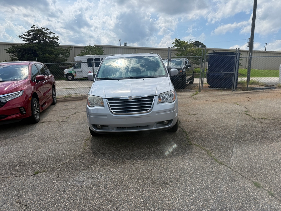 Grey Chrysler Town and Country with BraunAbility Side Entry Automatic Fold Out conversion