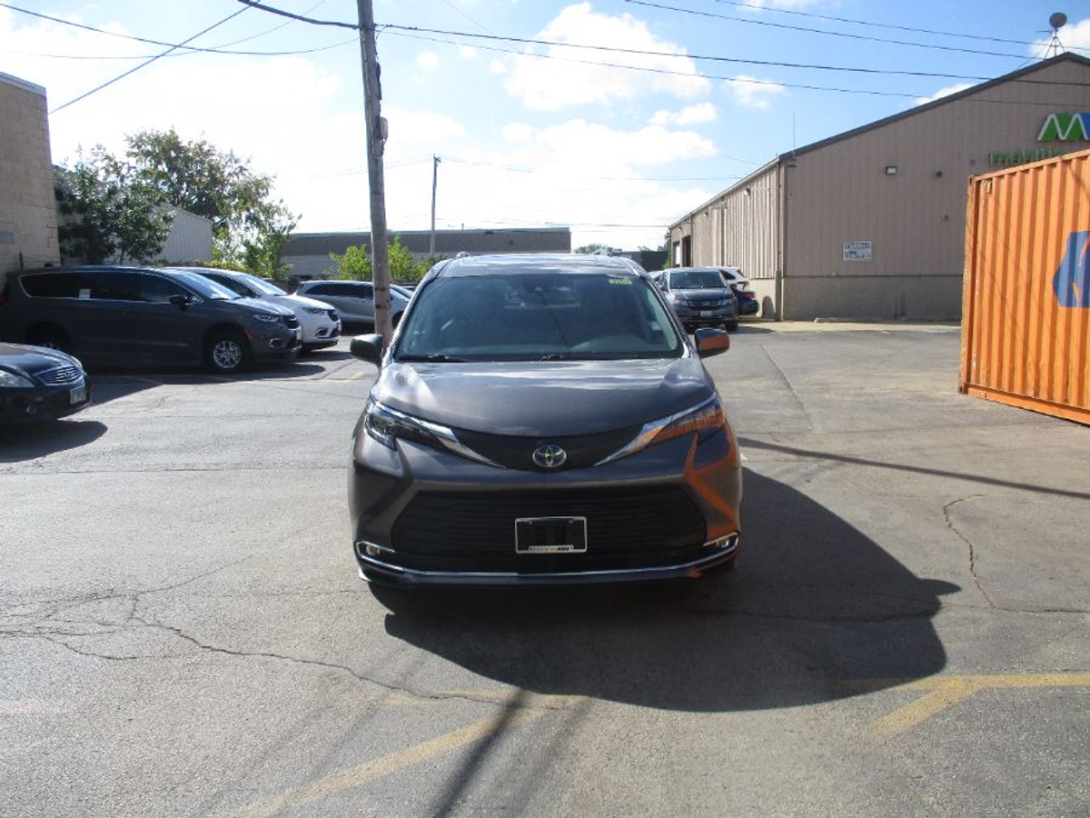 Grey Toyota Sienna with Driverge Rear Entry Manual Fold Out conversion