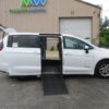 White Chrysler Pacifica with Driverge Side Entry Automatic Fold Out conversion
