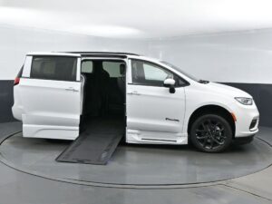 White Chrysler Pacifica with BraunAbility Side Entry Automatic In Floor conversion