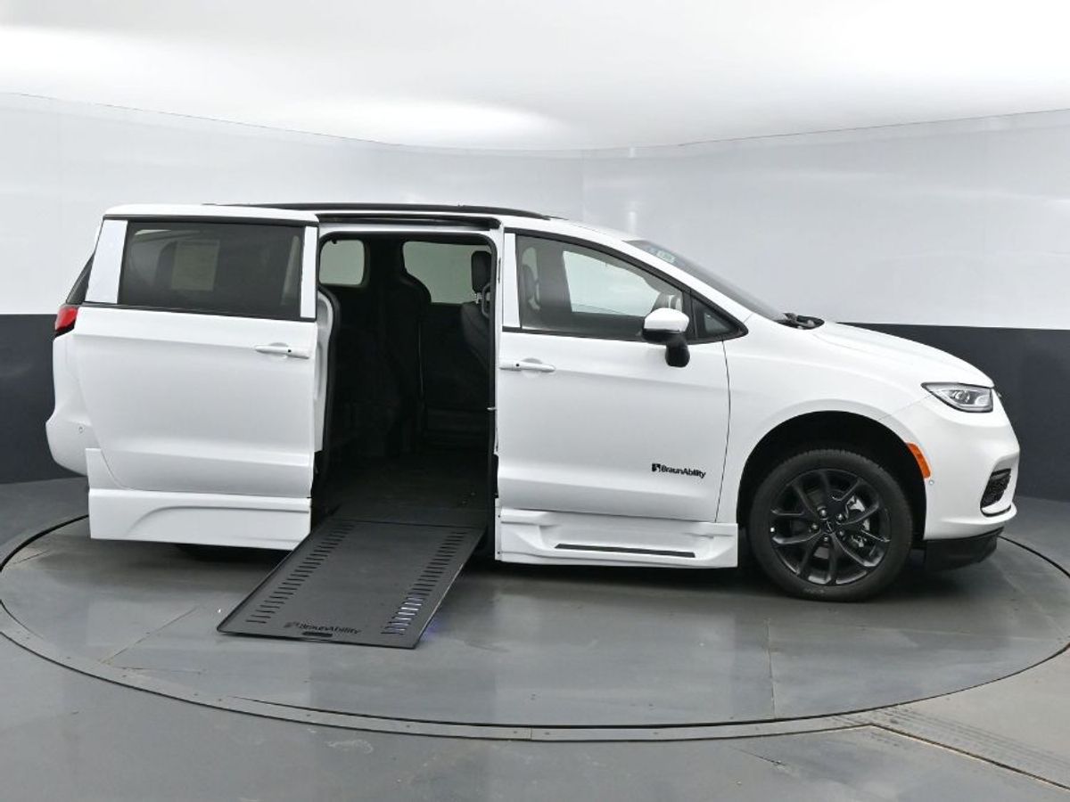 White Chrysler Pacifica with BraunAbility Side Entry Automatic In Floor conversion