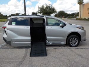 Silver Toyota Sienna with BraunAbility Side Entry Automatic Fold Out conversion