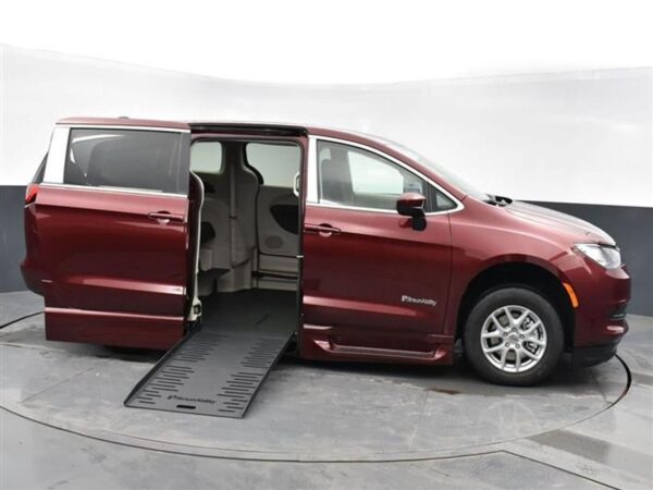 Red Chrysler Voyager with BraunAbility Side Entry Automatic Fold Out conversion