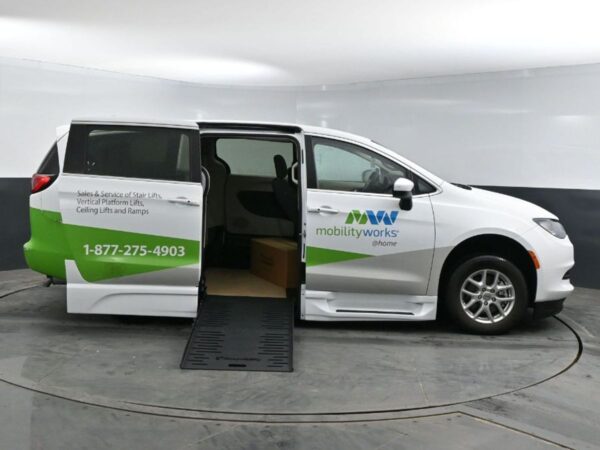 White Chrysler Voyager with BraunAbility Side Entry Automatic Fold Out conversion