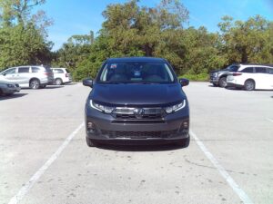 Grey Honda Odyssey with BraunAbility Side Entry Automatic In Floor conversion