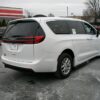 White Chrysler Pacifica with Driverge Side Entry Automatic Fold Out conversion