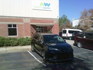 Blue Toyota Sienna with Driverge Rear Entry Manual Fold Out conversion