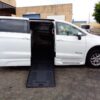 White Chrysler Voyager with BraunAbility Side Entry Automatic Fold Out conversion